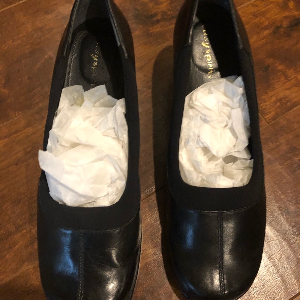 Black leather Easy Spirit flats.